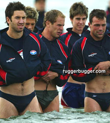 AFL stunners the Western Bull dogs spalshing around in the sea but inside they are totally nude and soaked up in the showers. - Its Juicy!